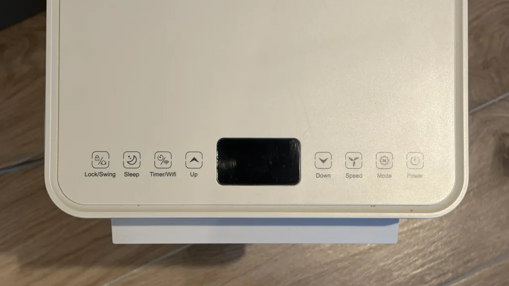 Le bandeau de commandes tactiles sur le dessus de l'appareil
